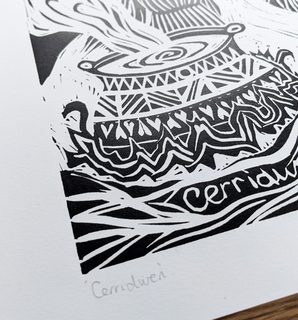 A linocut print depicting Cerridwen, featuring a cauldron with swirling smoke and intricate patterns, with the name 'Cerridwen' inscribed at the bottom.